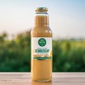 Glazen fles gembersap 'GO NOW' 100% biologisch, met label waarop gember staat.