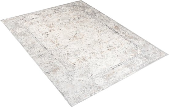 Un tapis vintage beige clair avec un motif détaillé dans des tons gris et marron.