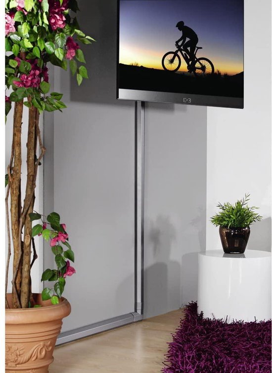 Zilverkleurige kabelgoot loopt langs een televisie waarop een fietser silhouet te zien is.
