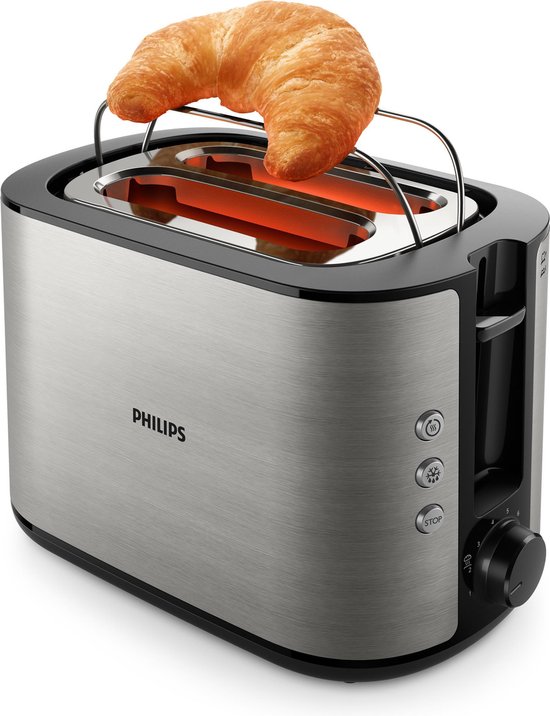 Grille-pain Philips argenté avec un croissant sur le dessus et des éléments chauffants rougeoyants.