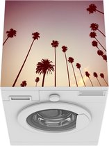Wasmachine beschermer mat - De silhouetten van een rij met palmbomen voor een roze lucht - Breedte 60 cm x hoogte 60 cm