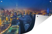 Tuindecoratie Dubai als een schitterende lichtgevende stad in de nacht - 60x40 cm - Tuinposter - Tuindoek - Buitenposter