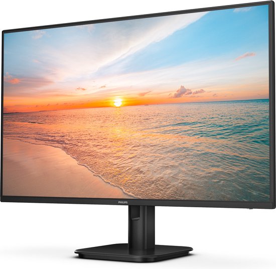 Zwarte Philips monitor met een zonsondergang op het scherm, rechts in beeld.