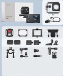WOLFANG GA100 actiecamera, accessoires en montage-opties. Inclusief camera, behuizing, afstandsbediening en microfoon.