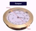 Compacte hygrometer met gouden rand, witte wijzerplaat, met afmetingen van 37mm en 9mm.