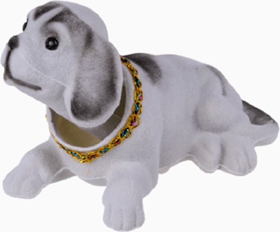 Een vrolijk lief knikkend hondje met een bewegende kop. Leuk om op de achterbank in de auto te zetten! Deze witte hond is voor decoratie en niet om mee te spelen. Natuurlijk is de hond ook leuk om cadeau te geven aan iemand.
