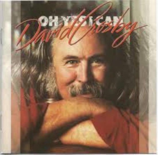 Albumcover van David Crosby's 'Oh Yes I Can' met een close-up van zijn gezicht, rode shirt en Krullend haar.