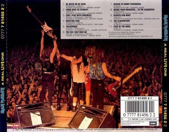 Achterkant van de 'A Real Live One' albumhoes met een live opname en tracklist.