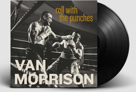 Albumcover met boxers in de ring en een vinylplaat ernaast. Tekst: 'roll with the punches', 'VAN MORRISON'.