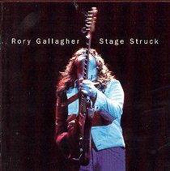 Rory Gallagher, Stage Struck. Een man met lang bruin haar houdt een gitaar vast.
