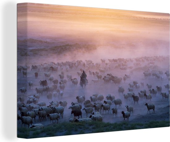 Canvas Schilderij Herder op ezel tussen kudde schapen in mist - 60x40 cm - Wanddecoratie