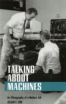 Twee mannen in wit overhemd bij apparaten, met de tekst TALKING ABOUT MACHINES.