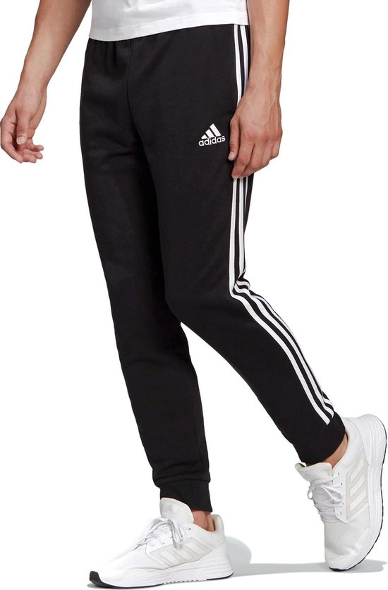 Pantalon adidas Essentials 3-Stripes Hommes - Zwart - taille L | bol.com
