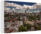 Canvas Schilderij Witte wolken boven Mexico-stad - 120x80 cm - Wanddecoratie