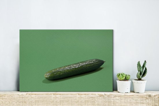 Un concombre représenté sur un fond vert Toile 30x20 cm - petit - Tirage photo sur toile (Décoration murale salon / chambre)