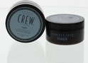 Twee American Crew Fiber potten, één geopend, één gesloten.