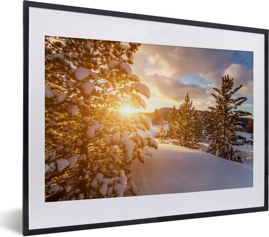 Photo en cadre - Un paysage d'hiver lors d'un coucher de soleil Cadre photo  noir avec... | bol.com