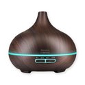 Diffuseur d'arômes en bois brun avec anneau LED bleu et boutons de commande pour la minuterie et la brume.