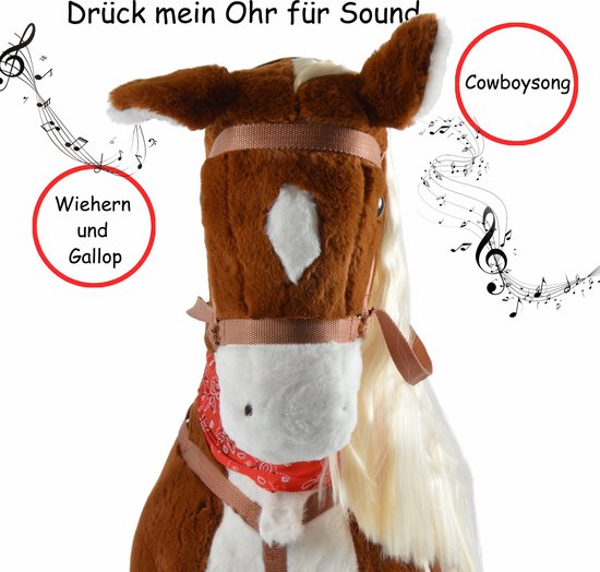 Bruin pluche paard met blonde manen, zadel en rode bandana. Tekst: "Drück mein Ohr für Sound".