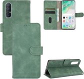 Voor OPPO Reno3 5G (Japanse versie) Effen kleur Huidgevoel Magnetische gesp Horizontale flip-kalftextuur PU lederen tas met houder & kaartsleuven & portemonnee (groen)