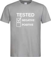 Grijs T shirt “ Tested Negative” tekst maat S