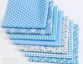 Pakket van 7 lapjes stof - verschillende designs - licht blauw - 24 x 25 cm - quilt - patchwork - poppen kleertjes