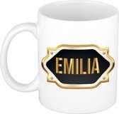 Emilia naam cadeau mok / beker met gouden embleem - kado verjaardag/ moeder/ pensioen/ geslaagd/ bedankt