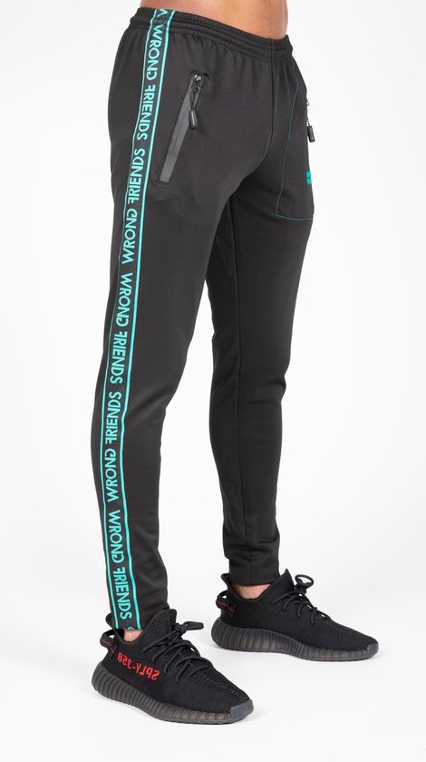 turquoise track pants