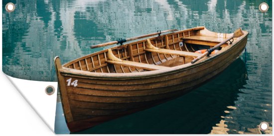 Schuttingposter Houten roeiboot in het meer Lago di Braies in Italië -  200x100 cm -... | bol.com