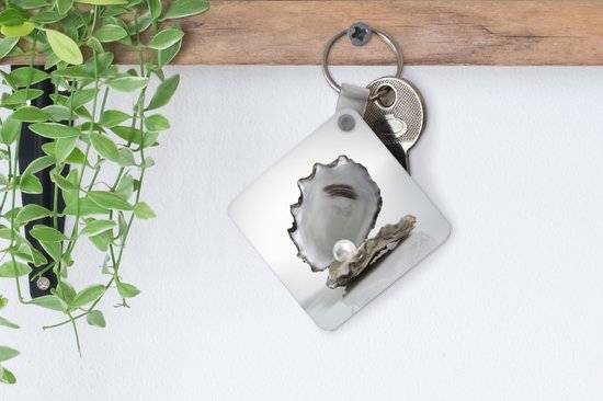 Porte-clés - Perle dans une huître - Plastique