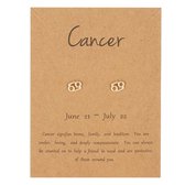 Bixorp Stars - Boucles d' Boucles d'oreilles en métal doré Signe du zodiaque du Cancer (Cancer) & Informations anglaises sur le signe du zodiaque
