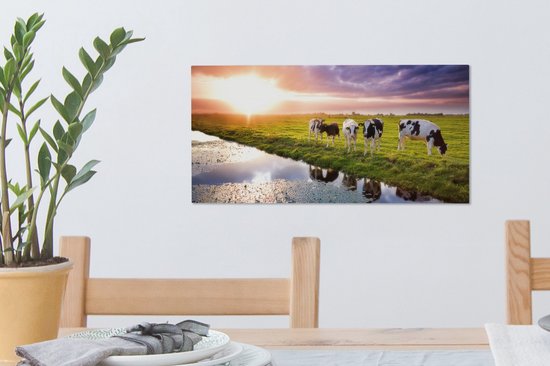Tableau sur toile Vaches pendant un coucher de soleil - 40x20 cm - Décoration murale Art
