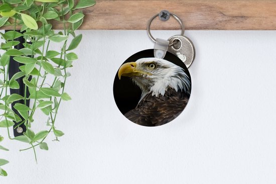 Porte-clés - Profil d'aigle sur fond noir - Plastique - Rond