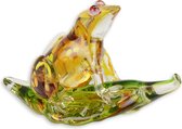 een murano glas figuur van een kikker op een blad