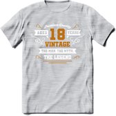 18 Jaar Legend T-Shirt | Goud - Wit | Grappig Verjaardag en Feest Cadeau Shirt | Dames - Heren - Unisex | Tshirt Kleding Kado | - Licht Grijs - Gemaleerd - L