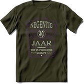 90 Jaar Legendarisch Gerijpt T-Shirt | Paars - Grijs | Grappig Verjaardag en Feest Cadeau Shirt | Dames - Heren - Unisex | Tshirt Kleding Kado | - Leger Groen - M