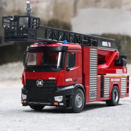 Camion de pompier avec volant télécommandé