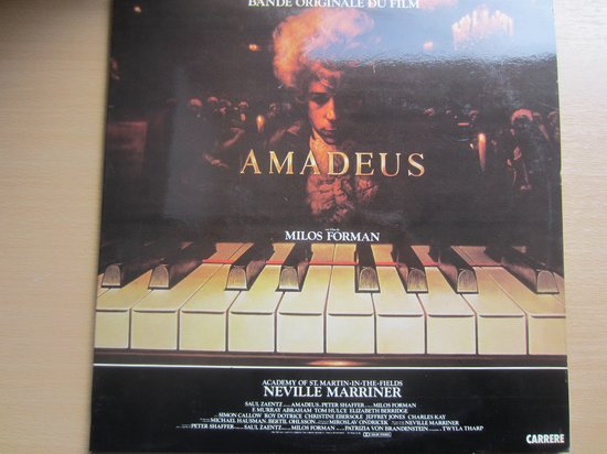 Albumhoes Amadeus met een toetsenbord en de titel 'Amadeus' en 'Milos Forman'.