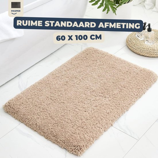 Beige badmat met shaggy textuur, ruime standaard afmeting 60 x 100 cm.