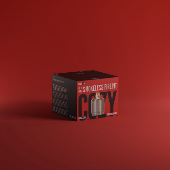 Een kartonnen doos voor een herQs Cozy rookloze vuurkorf met de tekst "COZY" en een afbeelding van de vuurkorf.