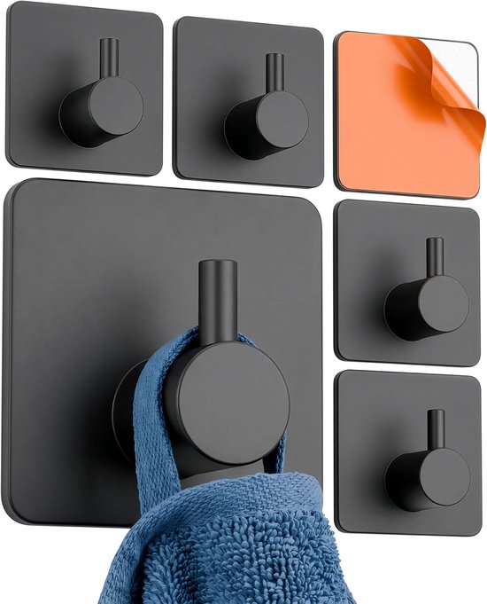 Zes matzwarte vierkante haakjes, één met een blauwe handdoek eraan.