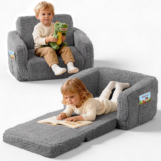 Grijze kinderfauteuil van teddy stof met uitschuifbaar gedeelte. Een jongen zit erop met een dino, een meisje ligt erop te lezen.