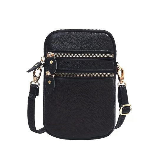 Zwarte lederen crossbody tas met drie ritsvakken en goudkleurige hardware. De tas heeft een verstelbare schouderband.