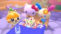 Sanrio-personages Hello Kitty, een geel katje en een blauw-wit konijn zitten aan een tafel met een opgestapeld broodje.