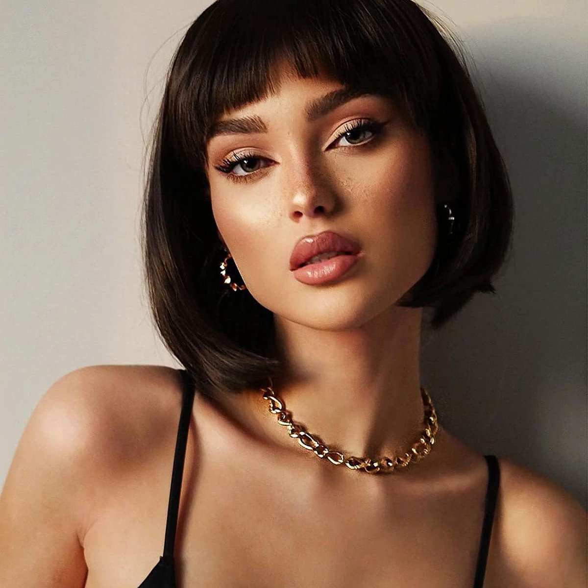 Bobpermanent met bangs - bruin - natuurlijk uiterlijk - perfect voor feesten - ShopVlot