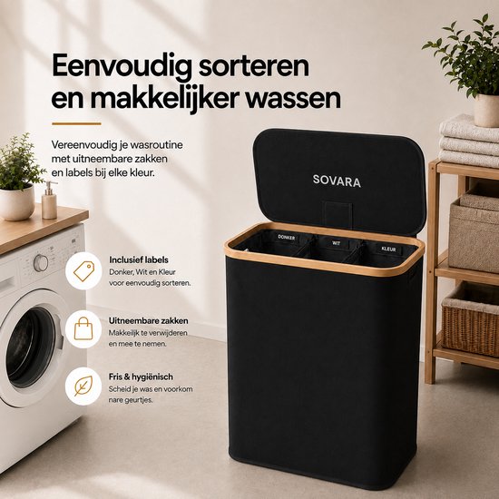 Zwarte wasmand met bamboe rand, geopend met drie uitneembare vakken met labels: Donker, Wit, Kleur.