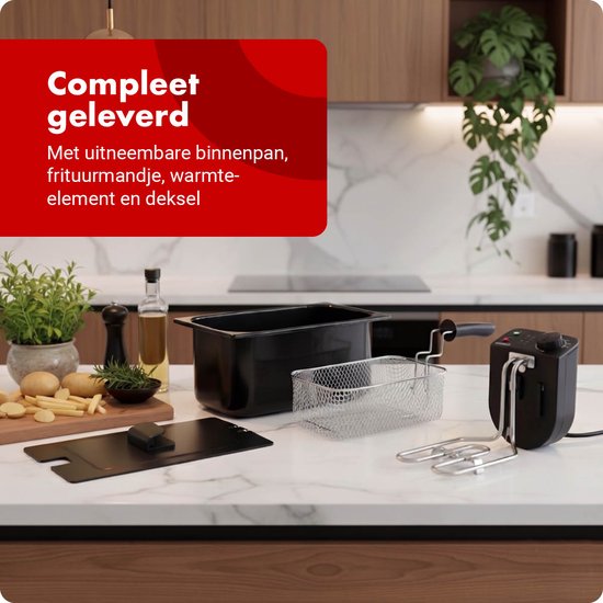 Zwarte Tomado friteuse met uitneembare binnenpan, frituurmandje, warmte-element en deksel op een aanrecht.