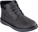 Donkergrijze veterschoen met veters, veters, metalen oogjes en een 'WATERPROOF'-patch.