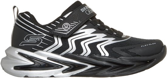 Zwarte Skechers Flex-Glow sneaker met zilveren zigzagpatroon, klittenband en lichtgevende zool.
