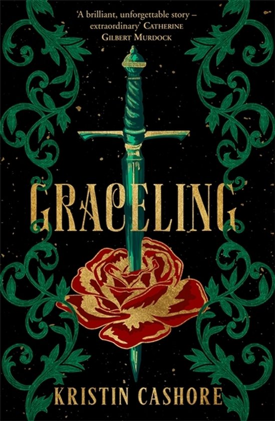 Boek "Graceling" met een gouden roos en een groene dolk op een zwarte achtergrond met groene versieringen.